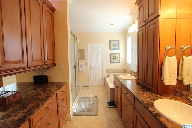 bathroom featuring tile patterned floors, vanity, ornamental molding, and plus walk in shower