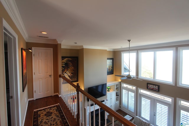 hall featuring crown molding and dark hardwood / wood-style floors