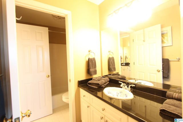 full bathroom with shower / bathing tub combination, vanity, toilet, and tile patterned floors