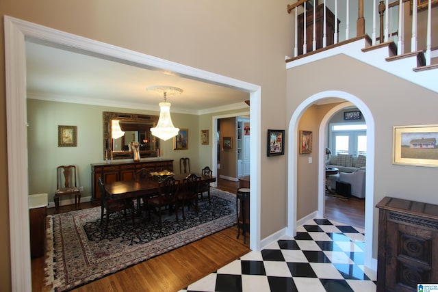 dining room featuring crown molding