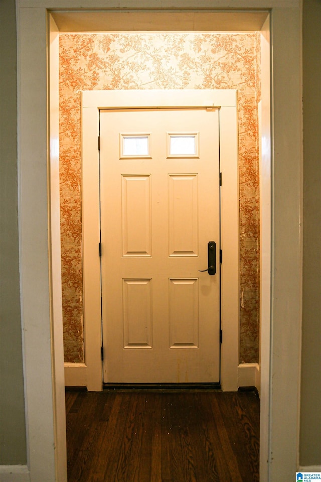 doorway to outside featuring dark hardwood / wood-style floors