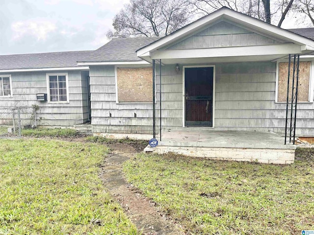 exterior space with a front lawn