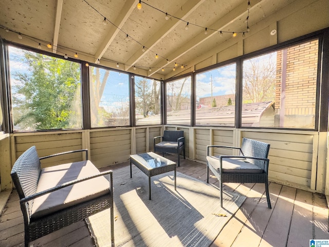 sunroom / solarium with vaulted ceiling