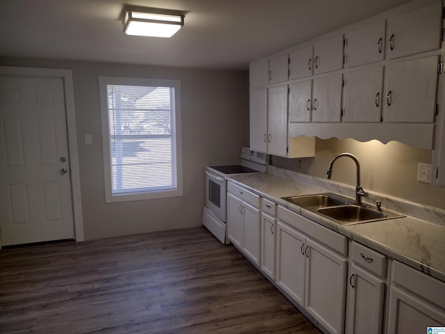 kitchen with light stone countertops, dark wood-type flooring, sink, electric stove, and white cabinetry