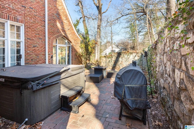 view of patio featuring a hot tub