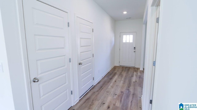 doorway featuring light hardwood / wood-style floors