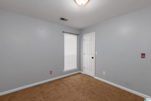 spare room with carpet flooring