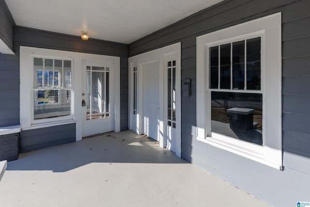 property entrance featuring covered porch