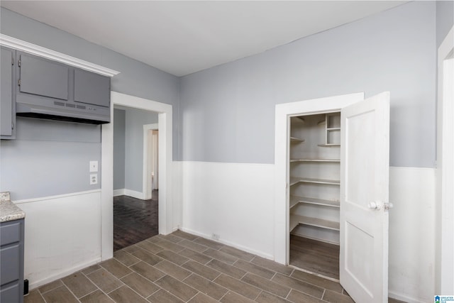 kitchen featuring gray cabinets