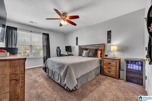 carpeted bedroom featuring ceiling fan