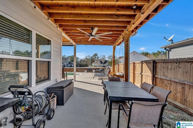 view of patio featuring ceiling fan