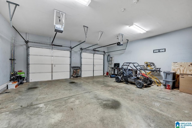 garage featuring a garage door opener