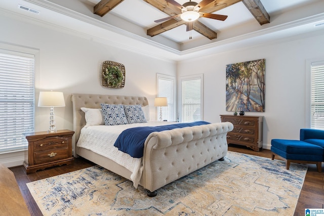 bedroom featuring coffered ceiling, hardwood / wood-style flooring, ceiling fan, ornamental molding, and beam ceiling