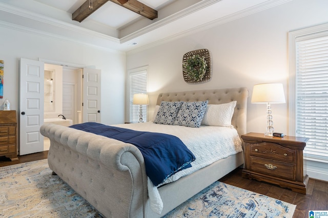 bedroom with beamed ceiling, connected bathroom, dark hardwood / wood-style floors, and crown molding