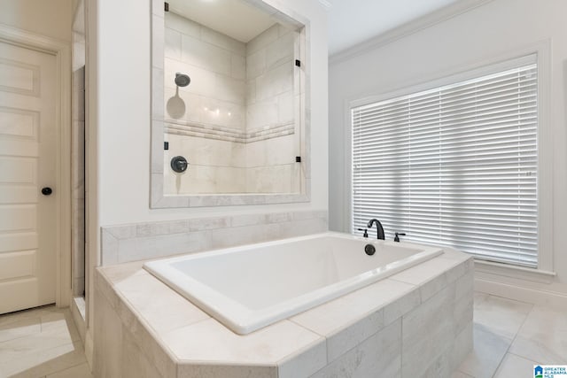 bathroom with tile patterned floors and separate shower and tub