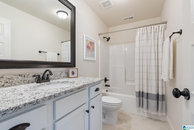 full bathroom with vanity, toilet, and shower / tub combo with curtain