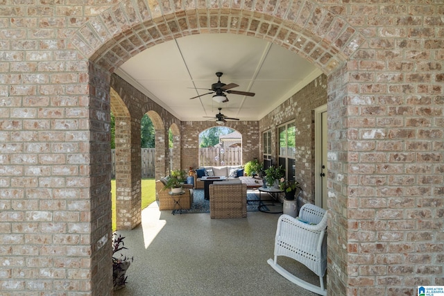 view of patio / terrace featuring an outdoor living space and ceiling fan