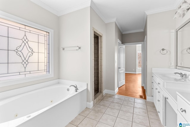 bathroom with tile patterned floors, vanity, separate shower and tub, and ornamental molding