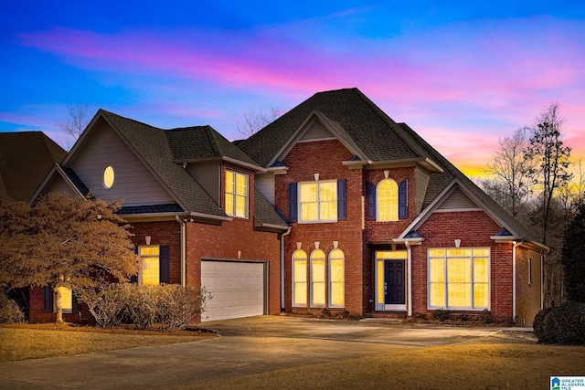 view of front of property featuring a garage