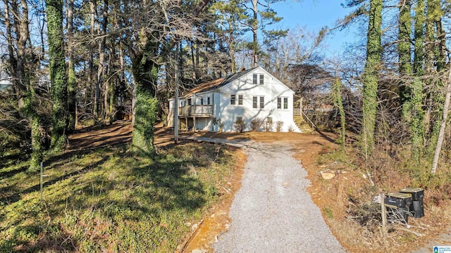 view of front of house with a wooden deck