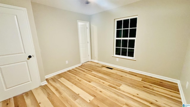 empty room featuring hardwood / wood-style floors