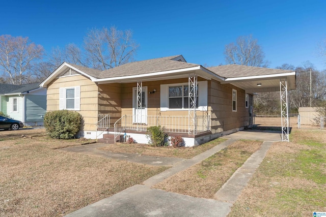 bungalow-style house featuring a carport