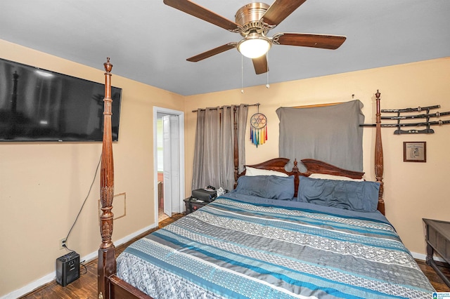 bedroom with dark hardwood / wood-style floors and ceiling fan