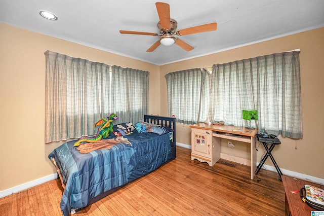 bedroom featuring ceiling fan and wood-type flooring