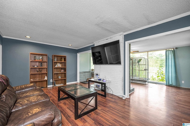 living room with a textured ceiling and ornamental molding