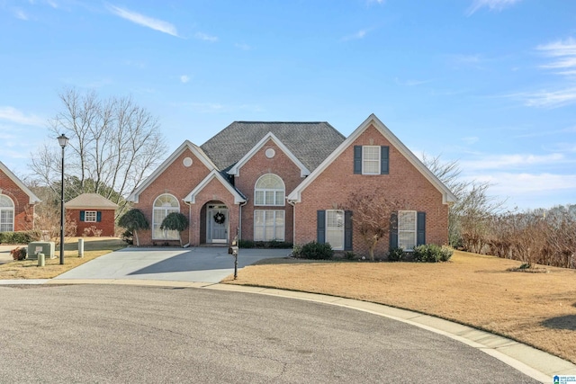 view of front property with a front lawn