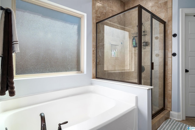 bathroom with independent shower and bath