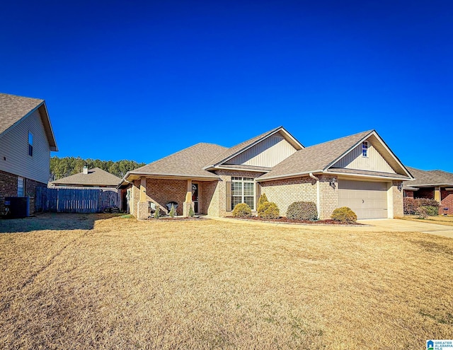 single story home featuring a garage and central AC