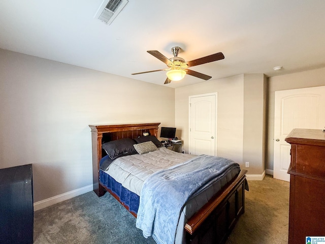 bedroom featuring dark colored carpet and ceiling fan