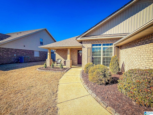 doorway to property with central AC