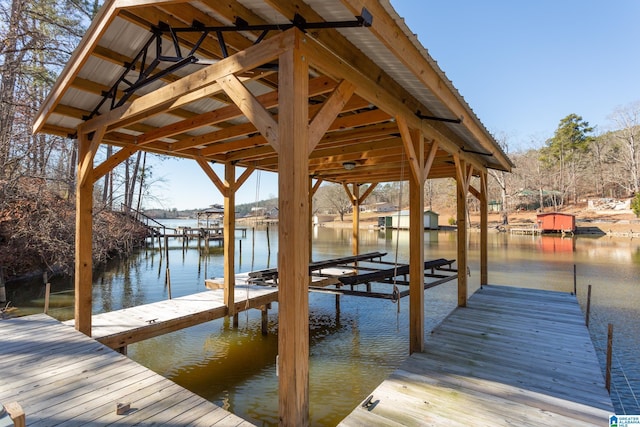 view of dock with a water view and boat lift