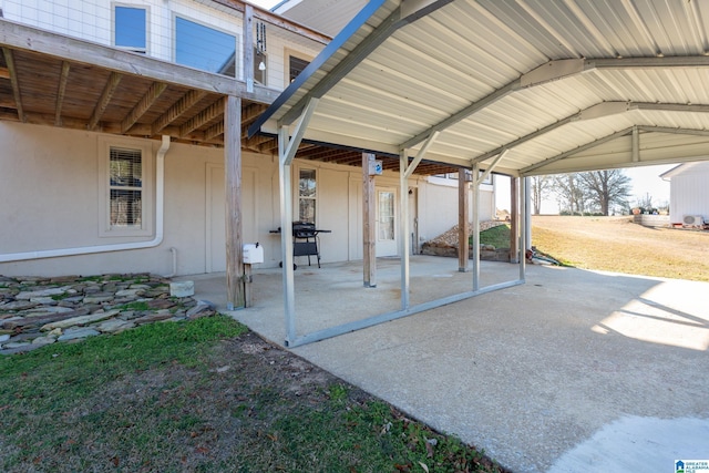 view of patio with a carport