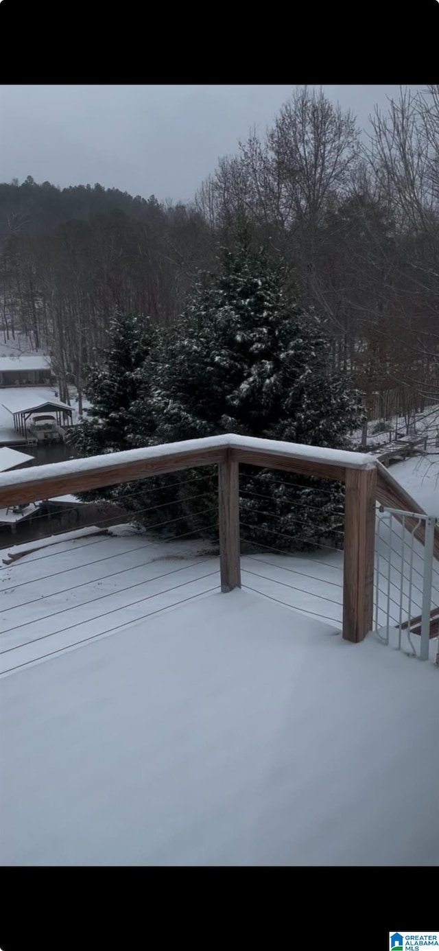 view of snow covered deck