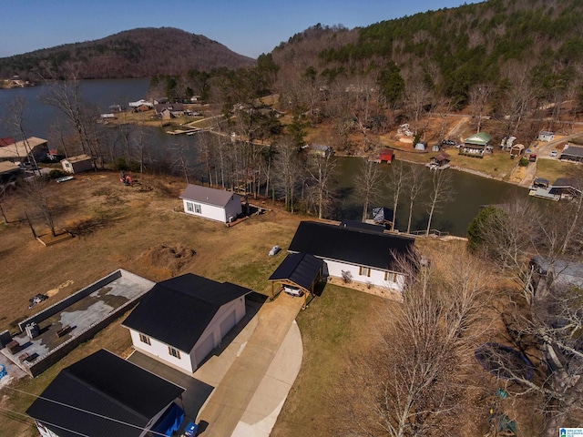 bird's eye view featuring a water and mountain view