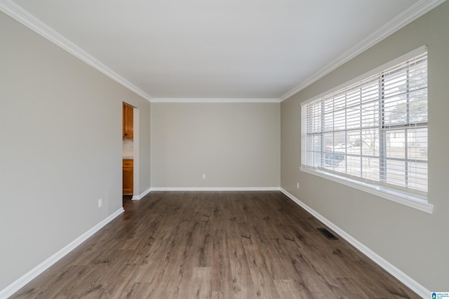 unfurnished room featuring crown molding and dark hardwood / wood-style floors