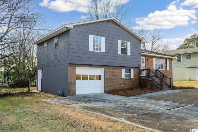 view of front facade with a garage, concrete driveway, and brick siding