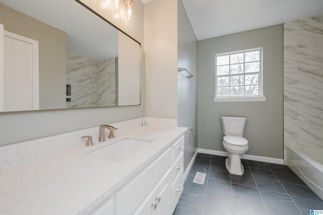 full bathroom featuring tile patterned flooring, vanity, toilet, and tiled shower / bath