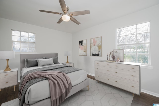 bedroom with light wood-type flooring and ceiling fan