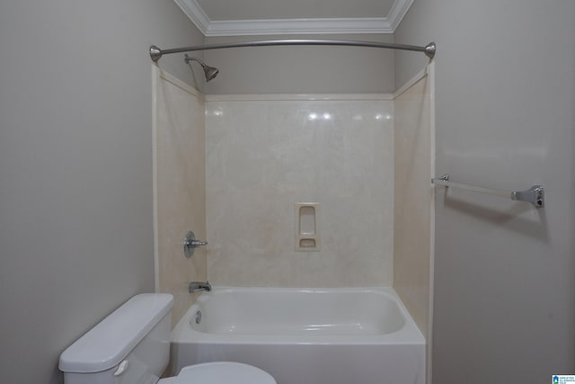 bathroom featuring crown molding, toilet, and tub / shower combination