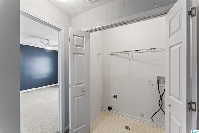 laundry area with ceiling fan, washer hookup, electric dryer hookup, a textured ceiling, and light carpet