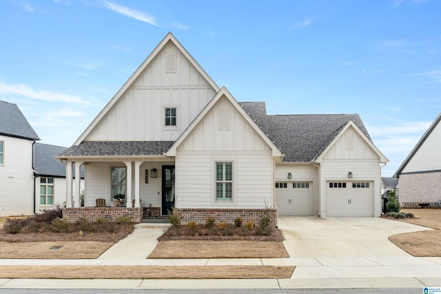 view of front facade with a porch and a garage