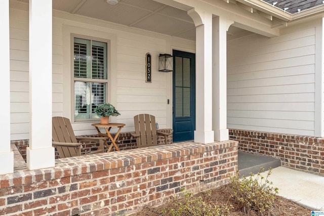 doorway to property featuring a porch