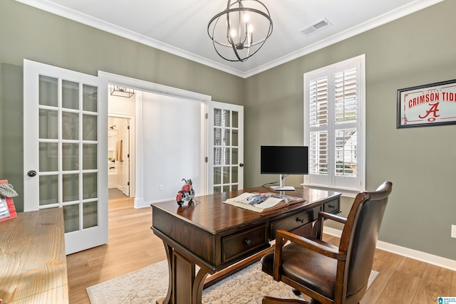 office area with a chandelier, french doors, light wood-type flooring, and ornamental molding