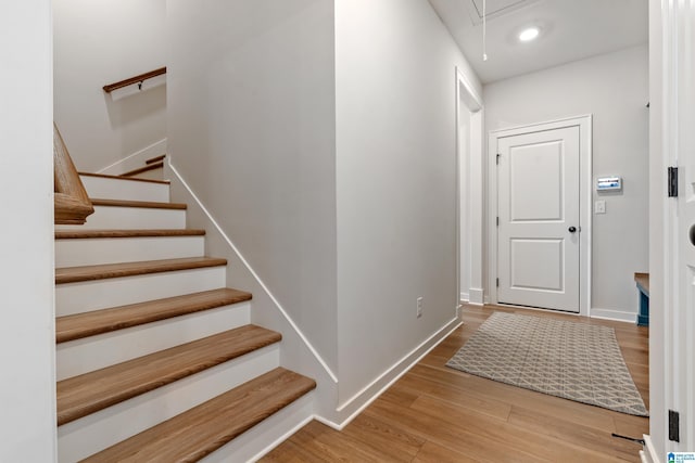 entrance foyer featuring wood-type flooring