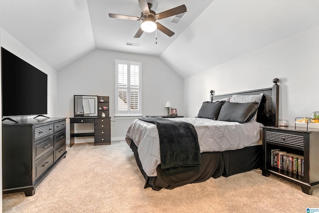 carpeted bedroom with ceiling fan and lofted ceiling