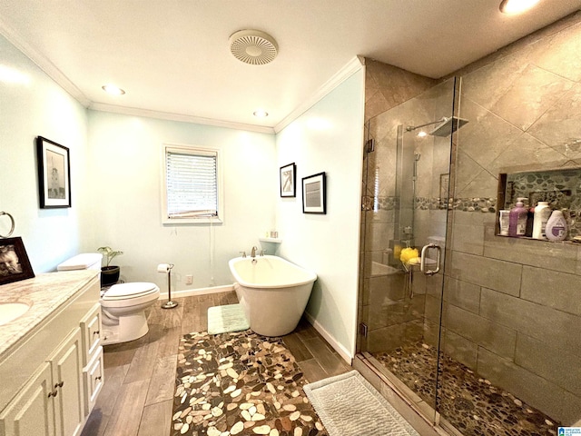 full bathroom with vanity, toilet, crown molding, and shower with separate bathtub